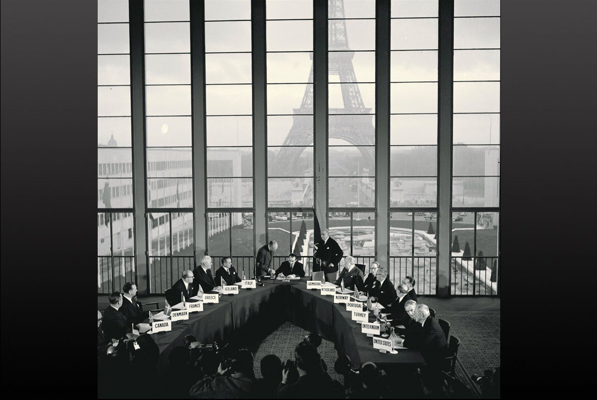 At NATO Headquarters in Paris, Allies sign a document inviting West Germany to join the Alliance. 