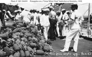 Pineapples piled on a battleship's deck during visit to Honolulu, July 1908.