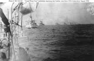 Fleet battleships steaming in column while entering Sydney harbor, Australia, 20 August 1908.