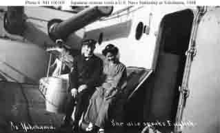 U.S. Navy Chief Machinist's Mate poses with Japanese lady on a battleship's deck during fleet's visit to Yokohama, Japan, October 1908.