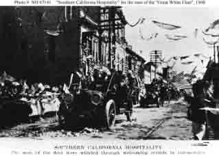 Halftone reproduction of photograph showing a procession in Southern California during the fleet's West Coast visit, circa spring or early summer 1908.