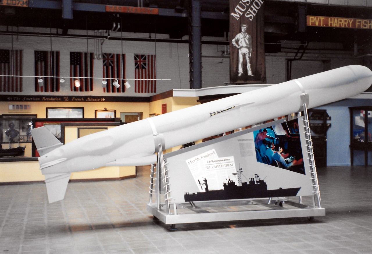 NMUSN-72 (Color): Presentation of Tomahawk Land Attack Missile, January 26, 1993. A presentation was held at the Navy Museum (now National Museum of the U.S. Navy) on the acceptance for display purposes. Image shows the Tomahawk on display in Bld...