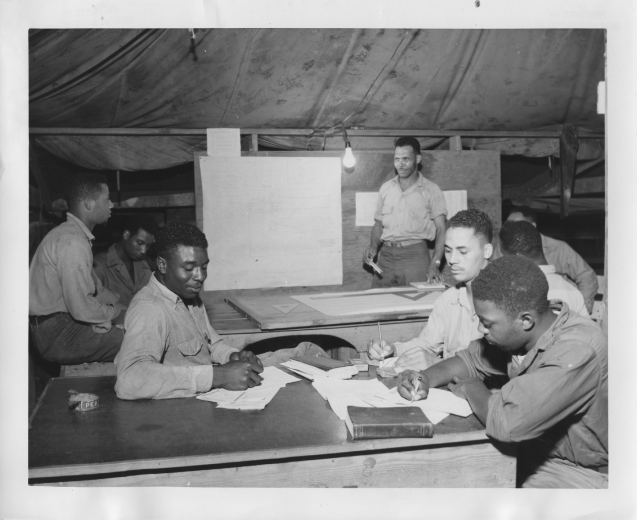 Seabees from the 34th NCB studying carpentry in class at Camp Kukum, Guadalcanal, 13 July, 1944