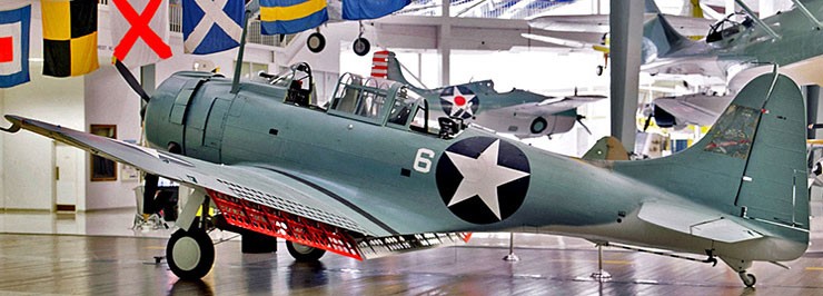 Color photo of SBD-2 Dauntless (Bureau Number 2106) on display at the National Naval Aviation Museum in Pensacola, Florida.