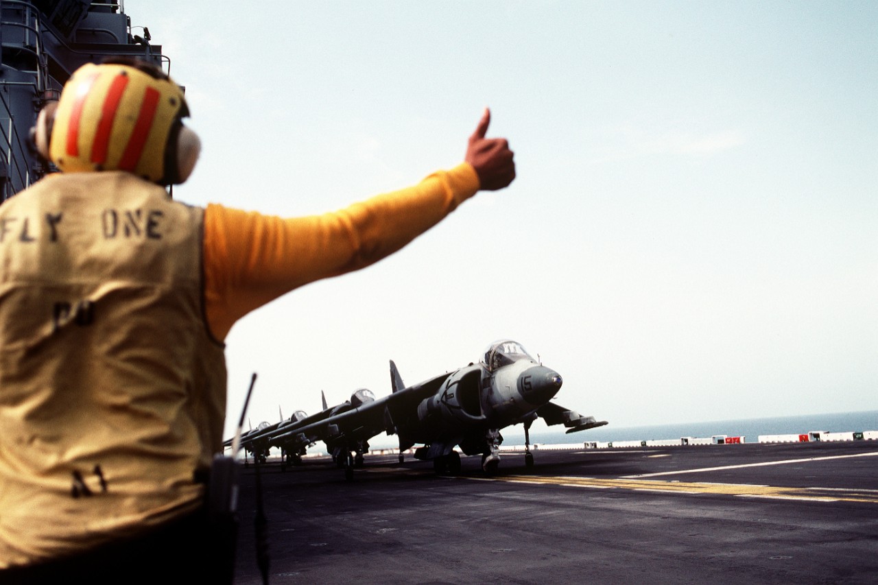 AV-88 Harrier aircraft line the flight deck of a U.S. Navy ship during Operation Desert Shield, 1 September 1990. (National Archives identifier: 6466513)