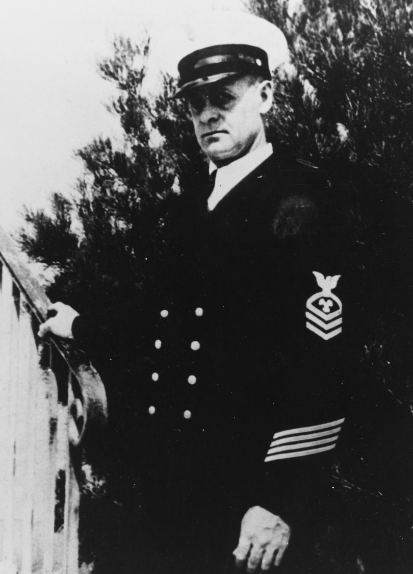 Black-and-white portrait of a white man in naval uniform.