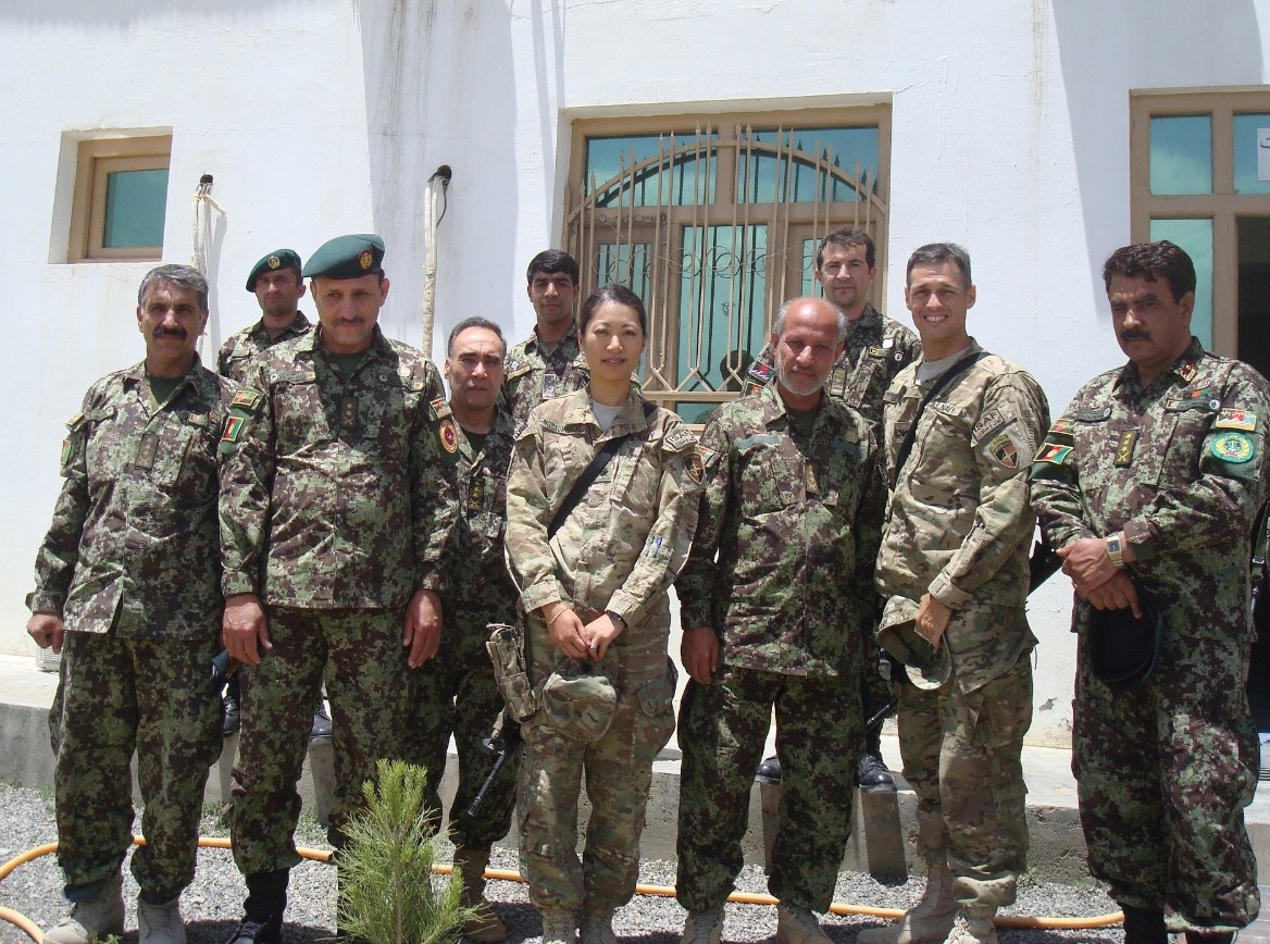 CAPT Elysia Ng-Baumhackl, JAGC, USN, Afghanistan in 2012, during her turnover with her relief, CAPT Bill Boland. The rest of the group in the photo were members of the Afghan National Army's Capital Division Staff Judge Advocate Office:  the SJA,...