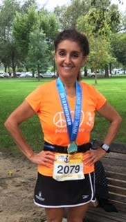 Captain Mery-Angela Sanabria Katson, USN, taking part in a marathon.