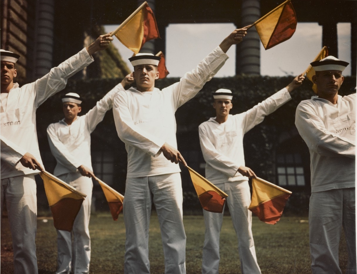 U.S. Naval Academy, Annapolis, Maryland. Midshipmen practice signaling with Semaphore flags, circa 1945