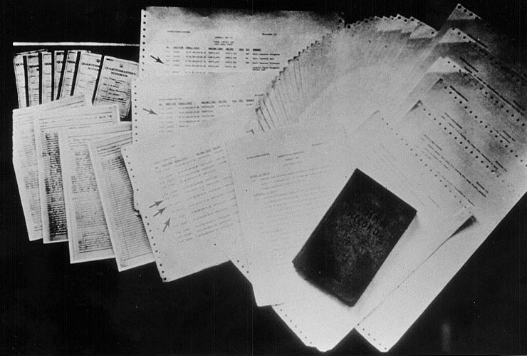 Poor quality photograph of navigation documents attributed to USS Pueblo. Click image to download.