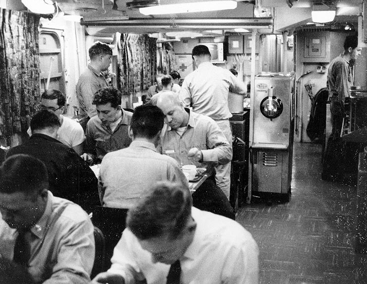 Scene in the crew's messing spaces, during a meal, 1967.