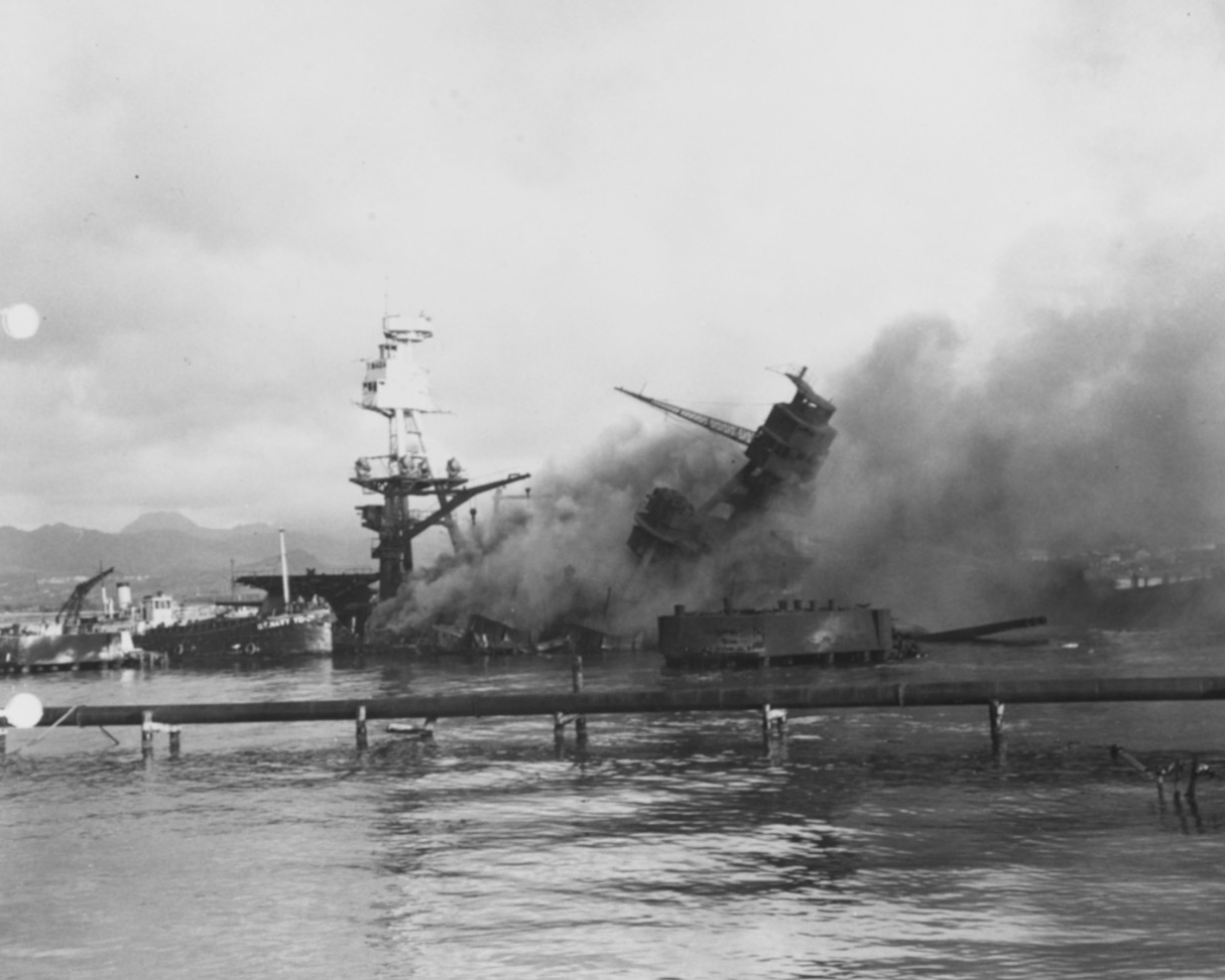 USS Arizona (BB-39) sunk and burning