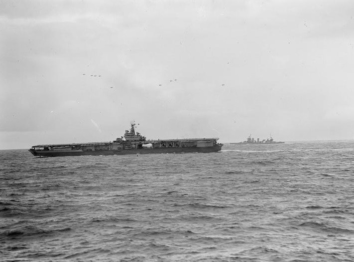 USS Ranger (CV-4) and HMS Belfast during Operation Leader, October 1943 (c) IWM (A 19598)