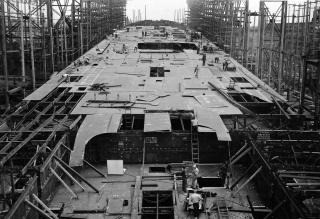 The future USS Hornet (CV-8), the third U.S. aircraft carrier at the Battle of Midway, under construction at Newport News Shipbuilding in August 1940. The Hornet was purchased after the Yorktown and Enterprise, with funds from the Naval Expansion...
