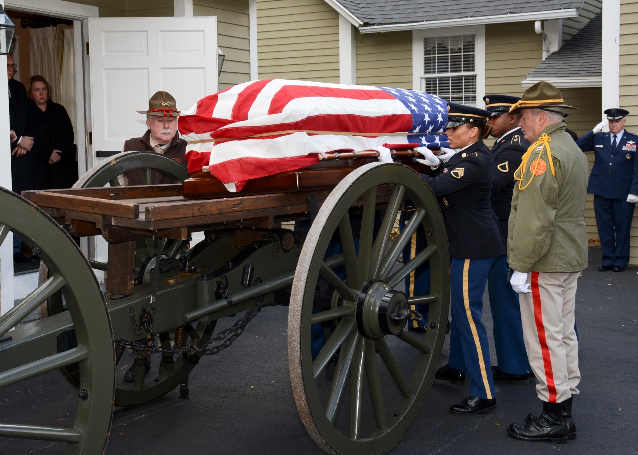 Concord, Mass. (Nov. 15, 2017) The Military Funeral Honors Team of the Massachusetts Army National Guard loads the casket of Medal of Honor recipient Capt. Thomas J. Hudner, Jr., onto a horse-drawn carriage during a funeral procession in Capt. Hudner’s honor. Capt. Hudner, a naval aviator, received the Medal of Honor for his actions during the Battle of the Chosin Reservoir during the Korean War. (U.S. Navy photo by Mass Communication Specialist 3rd Class Casey Scoular/Released)
