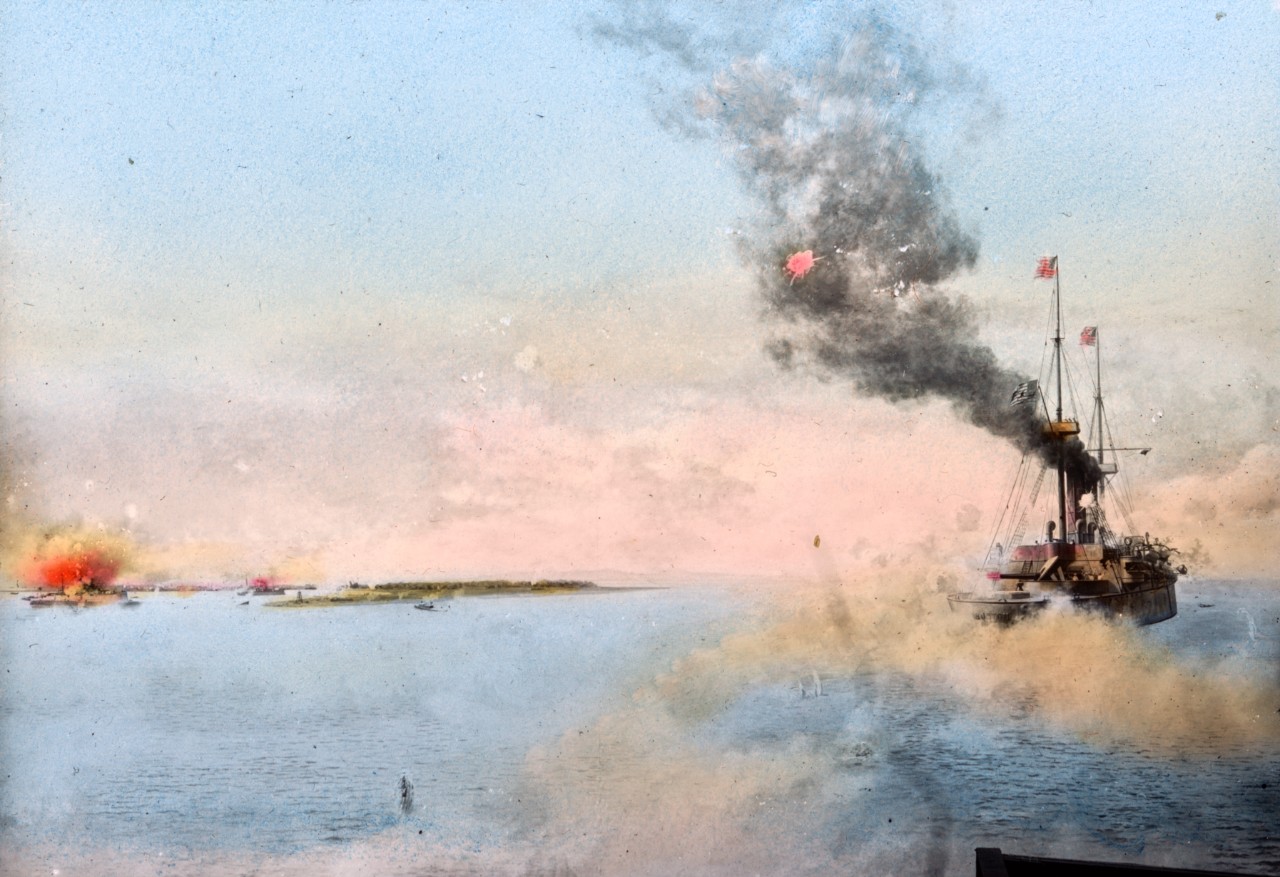 An undated colorized photo shows the protected cruiser USS Boston during the Spanish-American War.