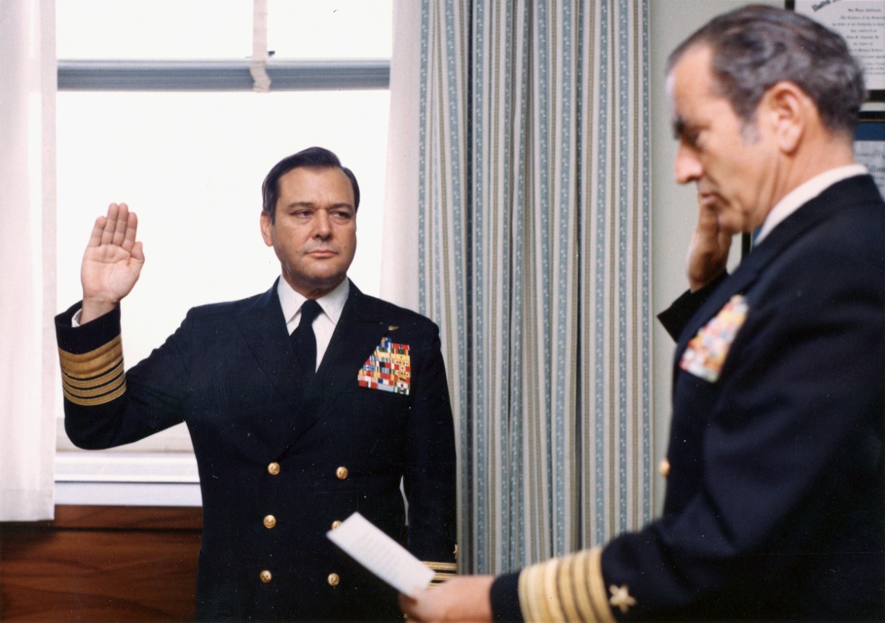 8 color and black and white images from the career of Admiral Admiral James L. Holloway III, USN. Shown: swearing in as VCNO by Admiral Elmo Zumwalt; laughing with USSR Admiral of the Fleet Nikolai Ivanovich Smirnov in 1978; as a Rear Admiral wit...