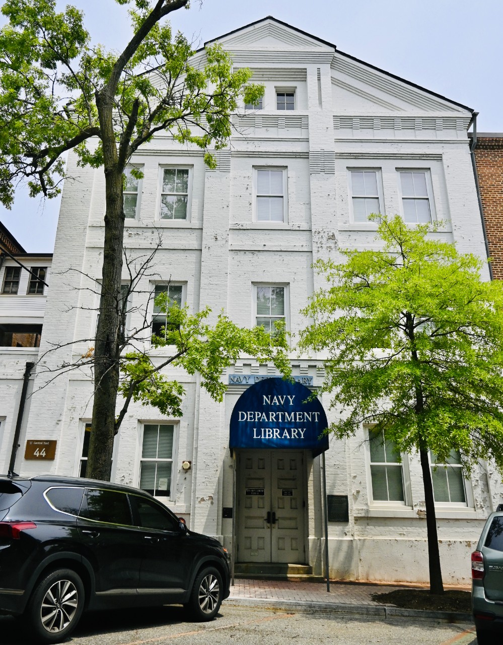 Entrance of the previous Navy Department Library facility which commenced relocation to a refurbished site on the historic Washington Navy Yard. The new Naval History and Research Center, a state-of-the-art, 2-floor structure, seamlessly combines...
