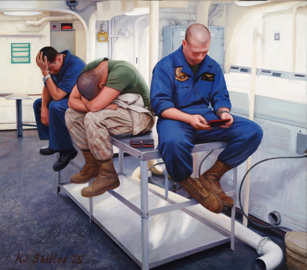 Three crewmen sit on a table in the laundry room looking bored