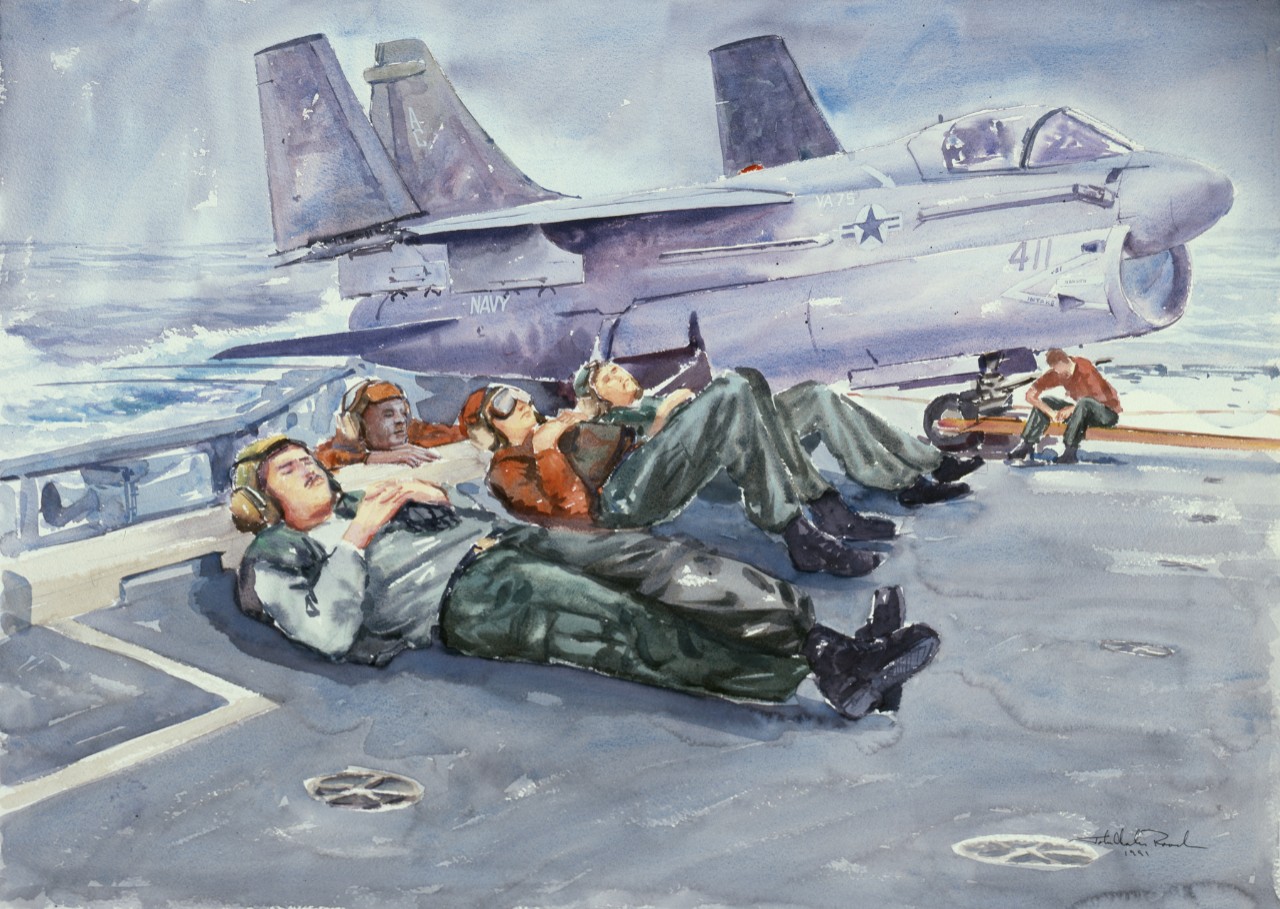 Four crewmen rest on the deck, with an airplane in the background