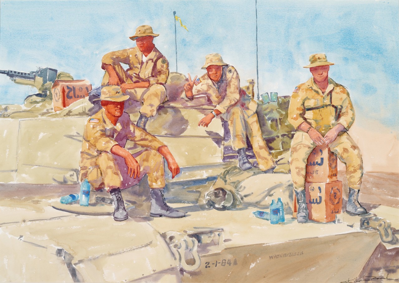 Four marines sitting on top of a tank 
