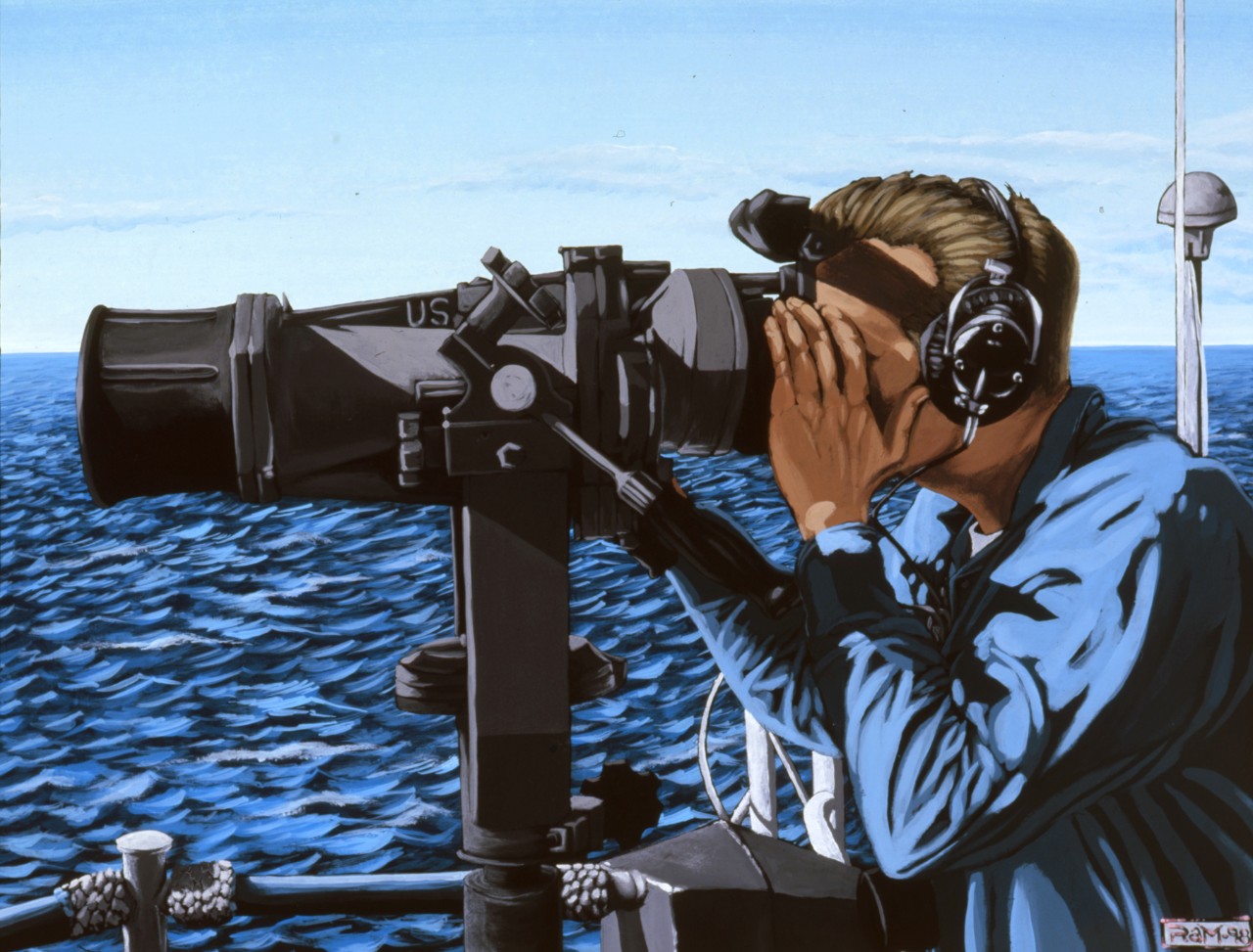 A sailors looks through binoculars on watch