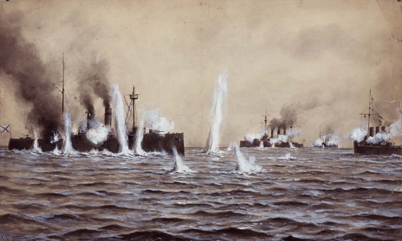 A ship on the left side is being shelled there are three other ships in the background