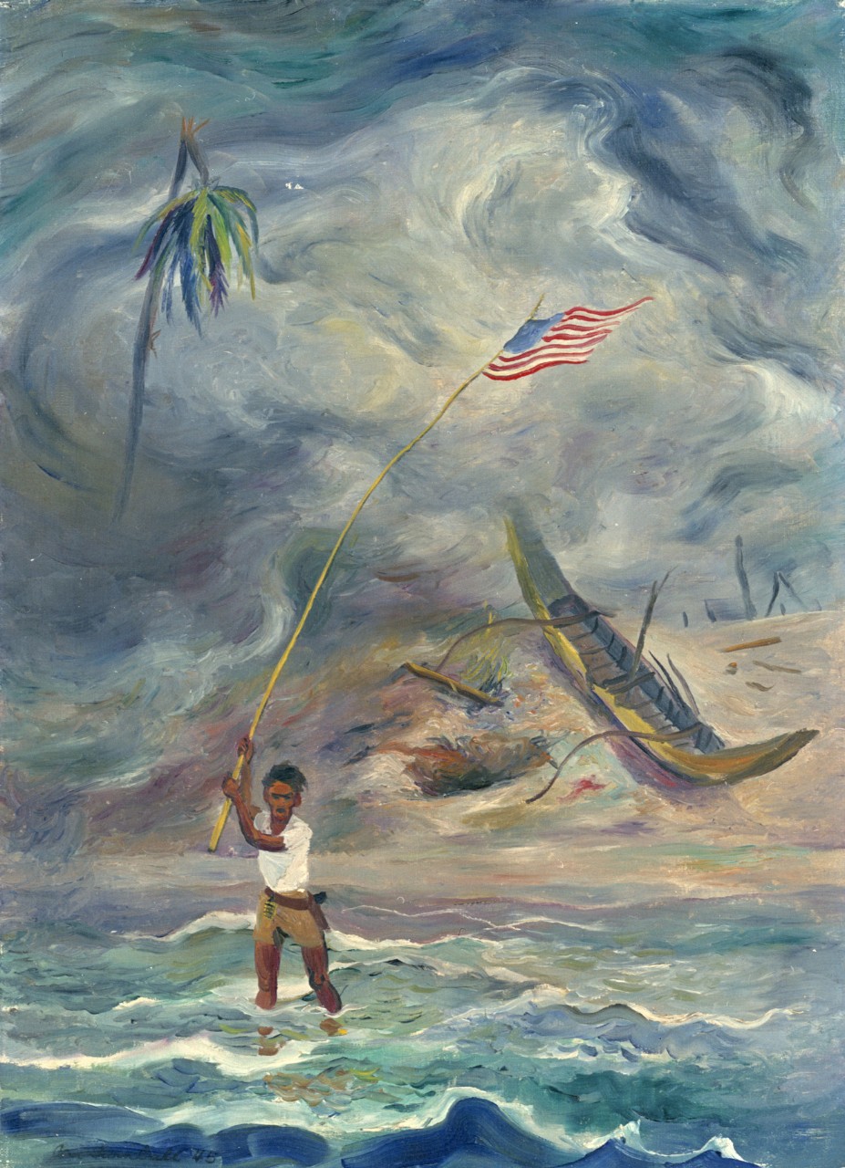 A Filipino standing in the surf waves a flag