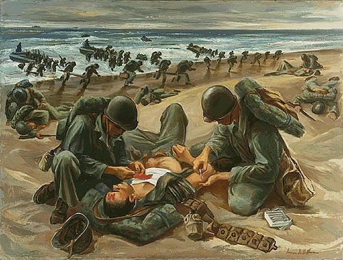 Corpmen on a beach help a wounded soldier