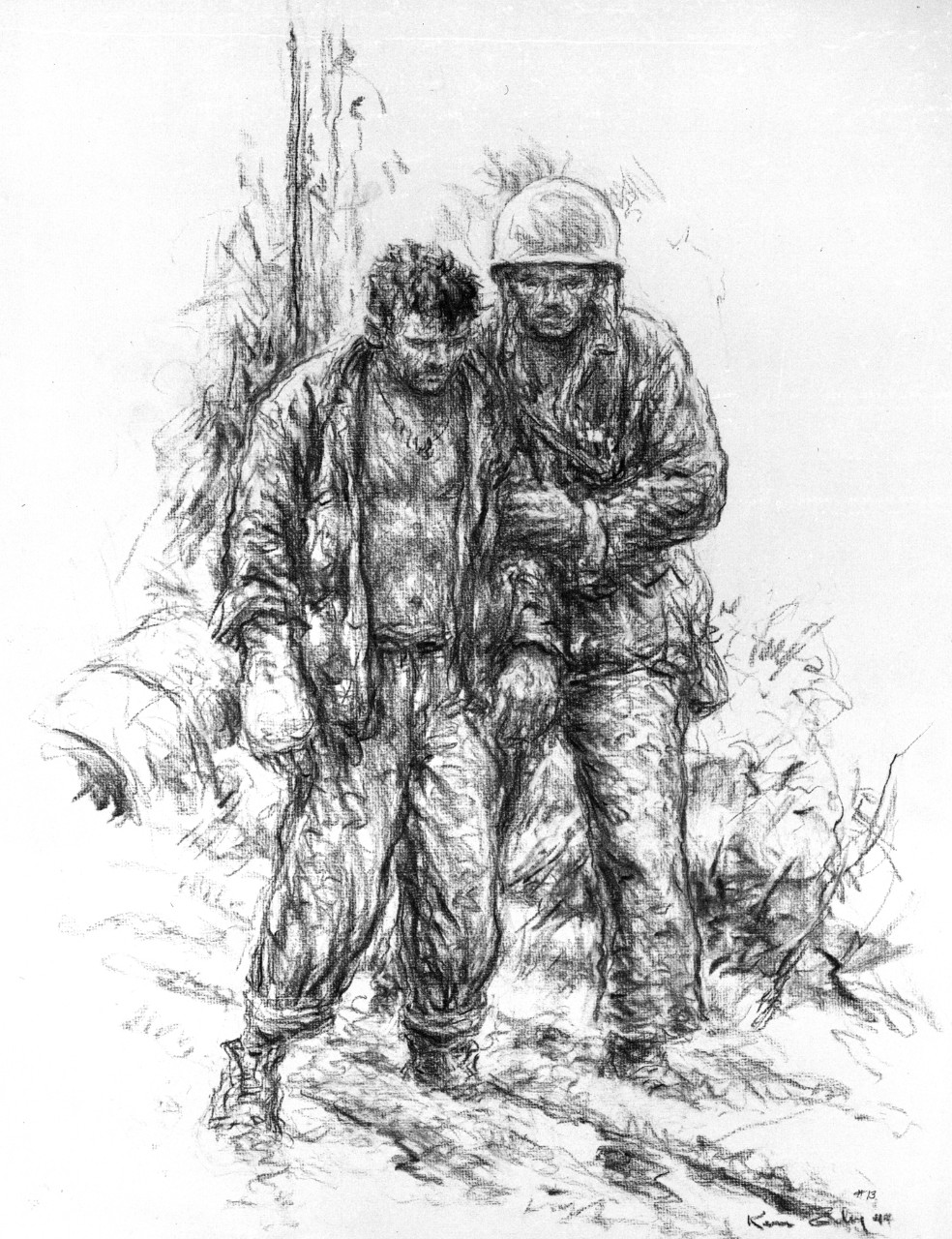 A Marine helps a fellow Marine 