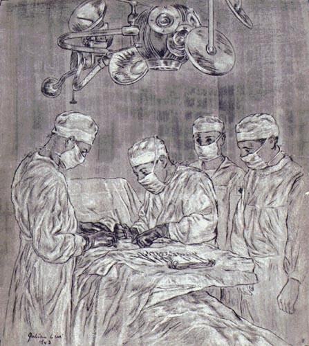 Two surgeons and two assistants performing surgery on a man