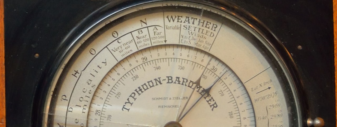Typhoon Barometer with dials in a black case
