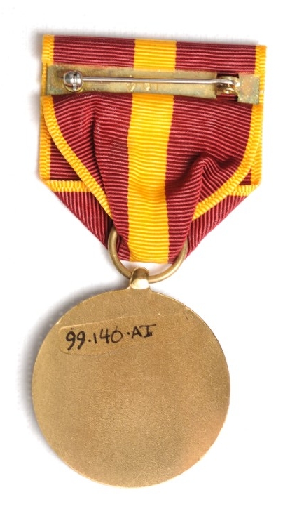 reverse of US Coast and Geodetic Survey Good Conduct Medal with pin and clasp visible