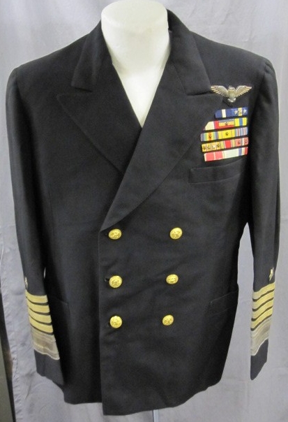 Dress Blue Jacket with Admiral Rank and Ribbons sewn on.