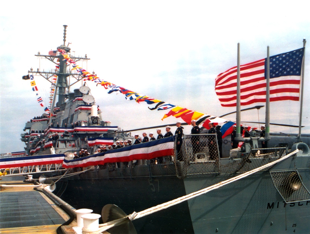 Collection of 37 color photographs related to the commissioning and decommissioning ceremonies of the following ships- decommissioning: USS Saratoga (CV-60) August 20, 1994, USS Dale (CG-19), September 22, 1994. Commissioning: USS Mitscher (DDG-57), December 10, 1994, USS Callaghan (DDG-994), August 29, 1981, USS Typhoon (PC-5), and February 12, 1994. Photos include views of the ship, crew, manning the rails, & speeches. The photographs were taken by the donor. 