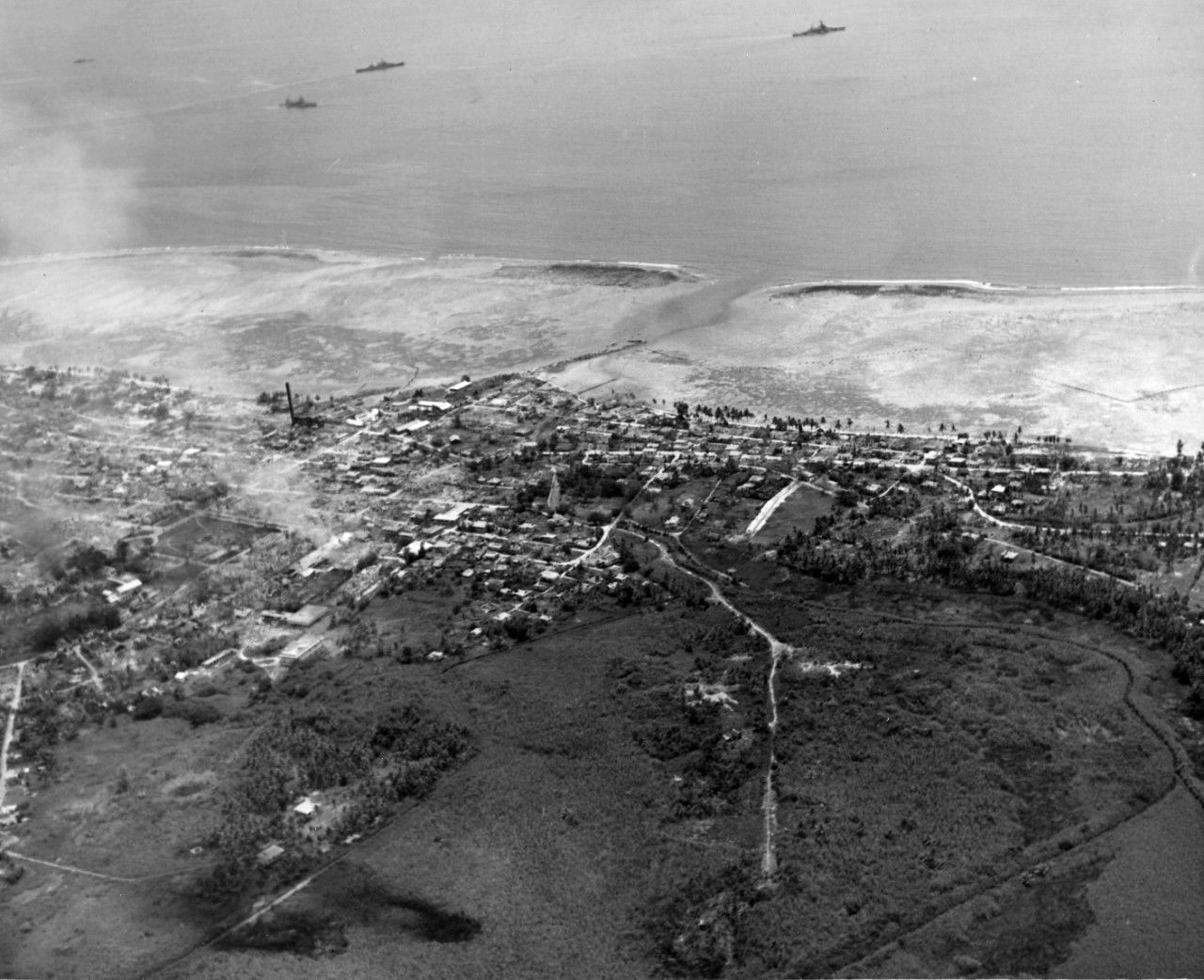Aerial of Agana, Guam. Photo taken by plane from USS Yorktown (CV-10). September 5, 1944. Photo is from the CAPT Hays R. Browning Photo Collection. 