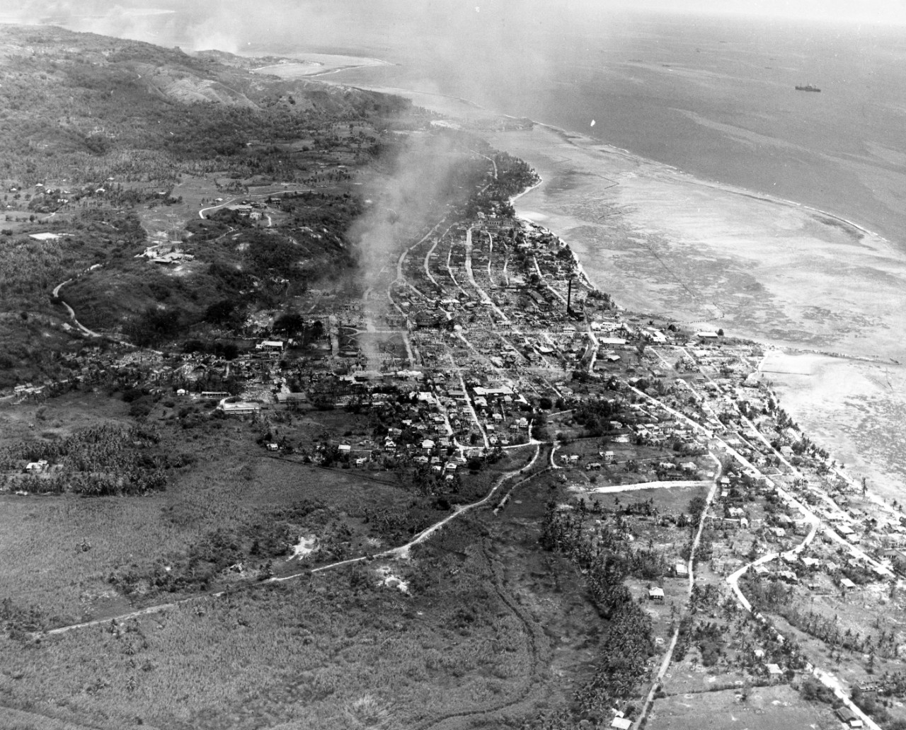 Aerial view of Agana, Guam. Photo taken by plane from USS Yorktown (CV-10). September 5, 1944. Image is from the CAPT Hays R. Browning Photo Collection. 