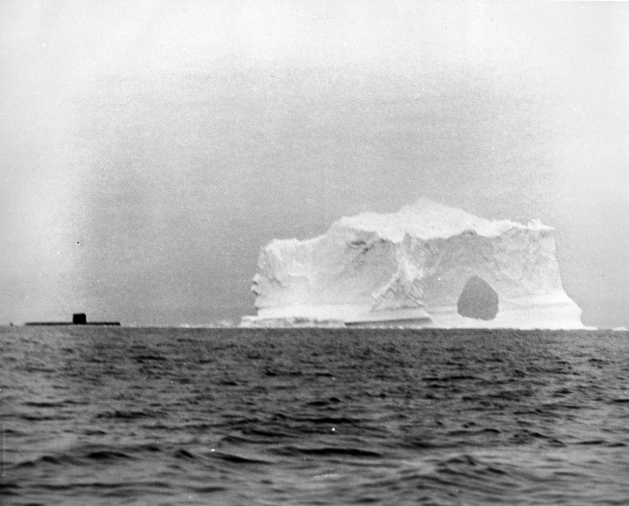 10 photographs of the SEADRAGON (SSN-584) on its first Arctic Cruise in the Fall of 1960. It was the first submarine to travel from the West to the East coast via the Northwest Passage and the first time photographs of the underside of ice formations had been taken. Donor: Admiral Robert L. DENNISON, USN (RET.), ACC # 79-003. Photos from the USN 1050047-1050057 series.
