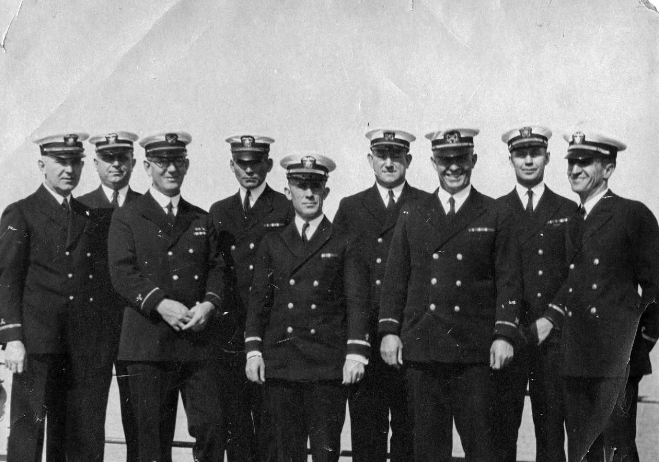 1 black and white photograph showing chiefs and warrant officers of USS Medusa (AR-1) shortly after the ship commissioned in 1924. Shown are: Chief Machinist Z.W. Sherwin, Chief Pay Clerk Albert Fender, Machinist W.J. Lowe, Chief Gunner S.A. Klish, Chief Radio Electrician R.J. Ostrander, Pay Clerk G.A. Howard, Boatswain H.L. Arnold, Chief Carpenter J.A. Kemmler, Chief Electrician C.W. Piper.