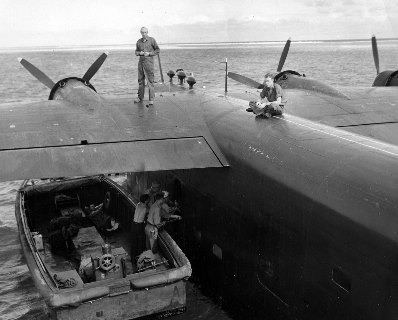 Loading cargo on to Naval Air Transport Service (NATS) aircraft at Ulithi Atoll, 1944.