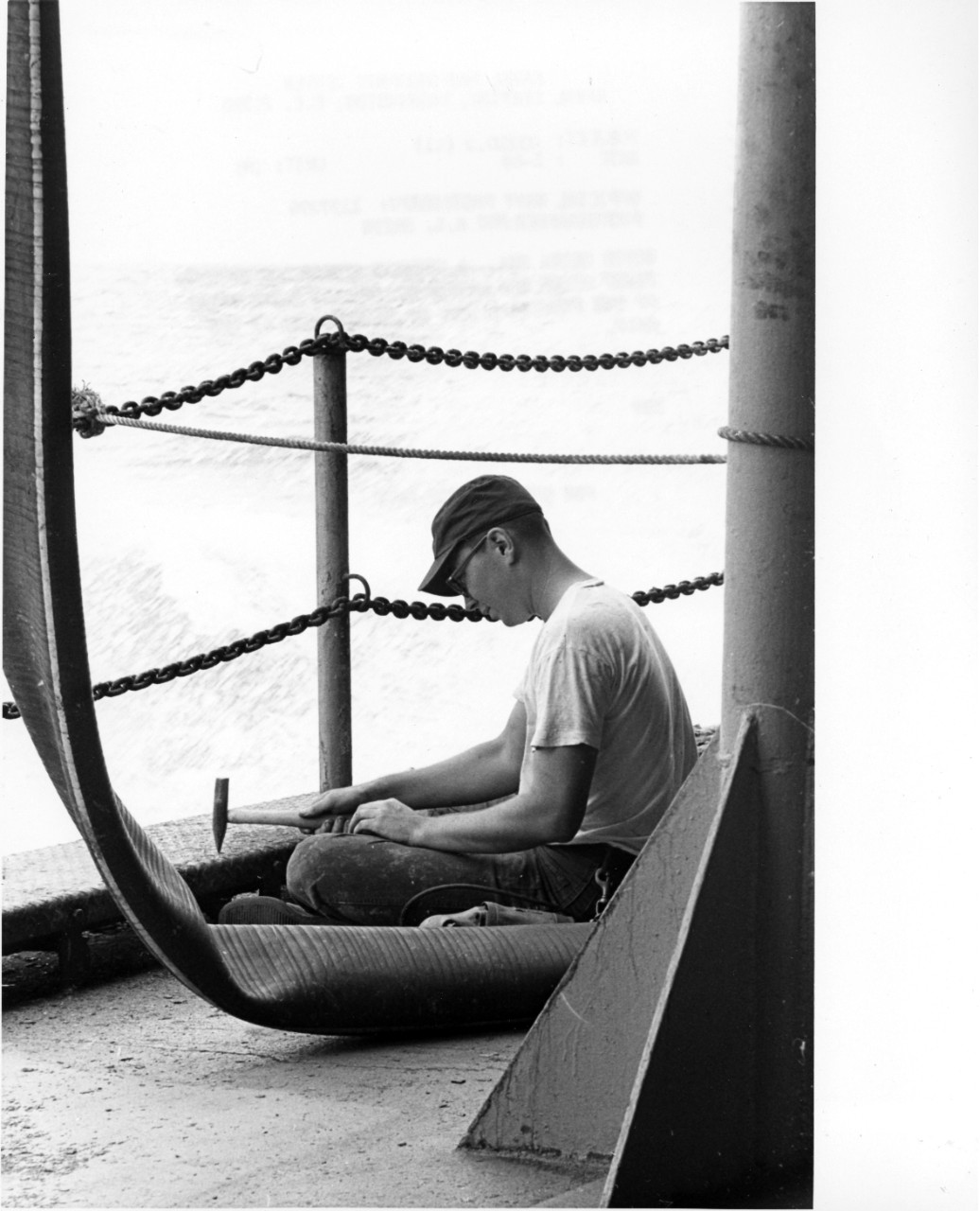 <p>South China Sea - a crewman aboard the seventh feet oiler USS Mattaponi (AO-41) chips paint, a perpetual task of maintenance of the ship. January, 1969.</p>