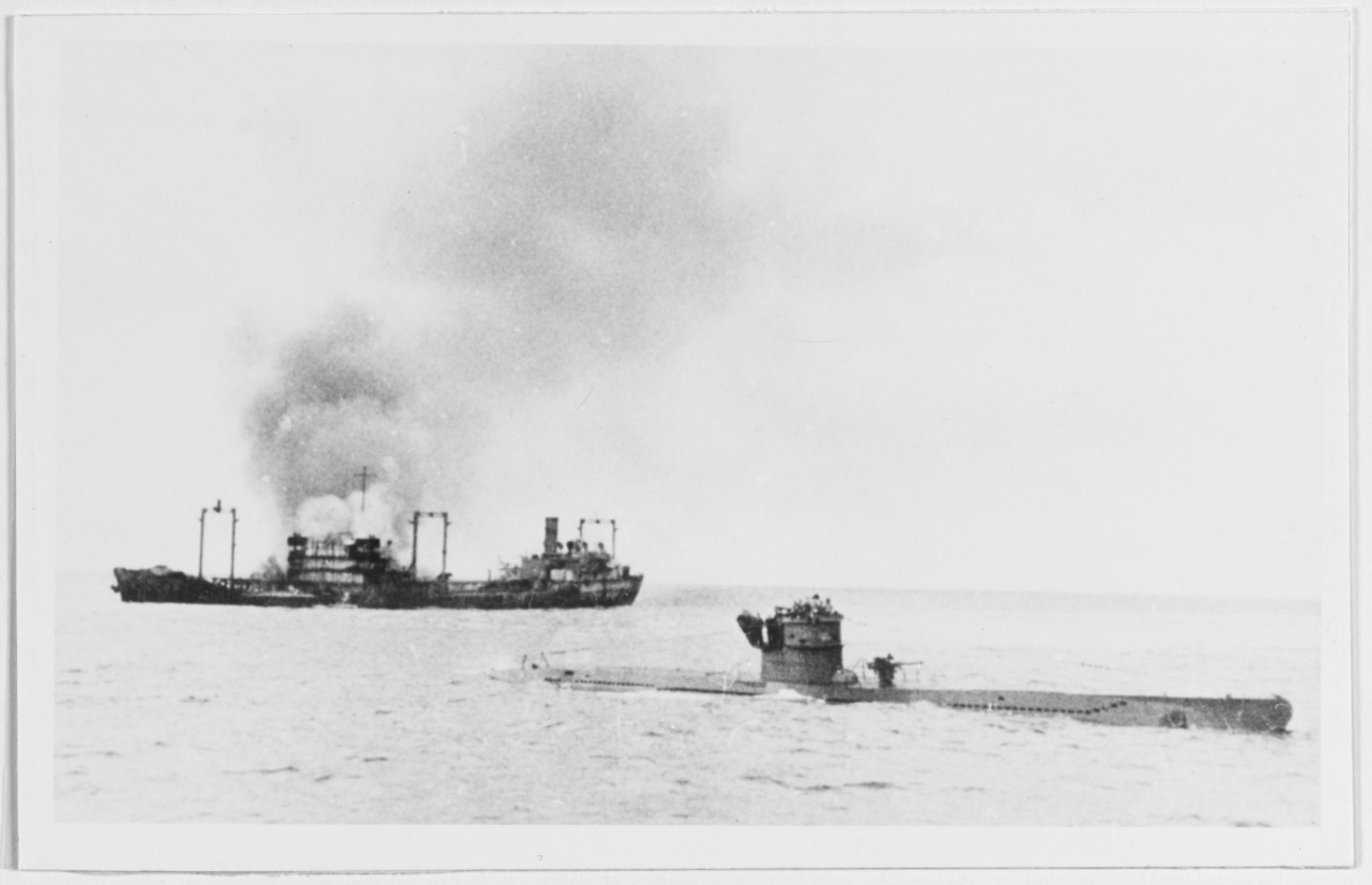 U-442 in front of burning tanker of convoy TM in January 1943.