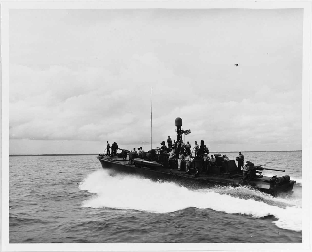 USS PT-490 with General Douglas MacArthur aboard (visible amidships), carrying him and his staff from Negros Island to Iloilo, Panay, in 1945