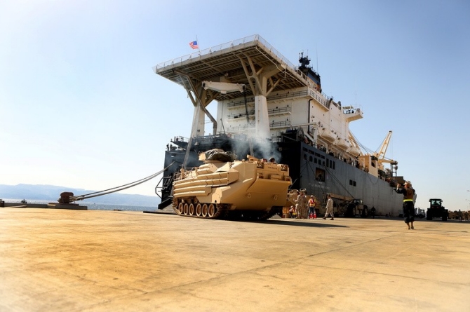 1st Lt. Baldomero Lopez- a vehicle is off-loaded at Aqaba-14Jan2012-20140710131302-f523282b-me