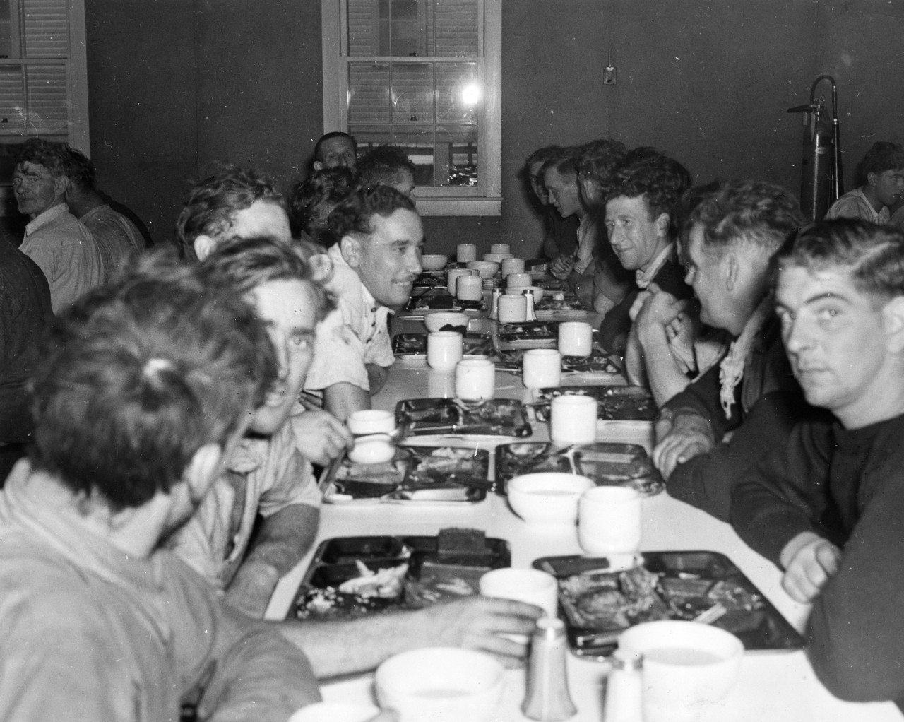 Empire Thrush’s sailors sample U.S. Navy chow at the Receiving Station, NOB Norfolk, 15 April 1942 (U.S. Navy Photograph 80-CF-105-4A-2, National Archives and Records Administration, Still Pictures Branch, College Park, Md.)