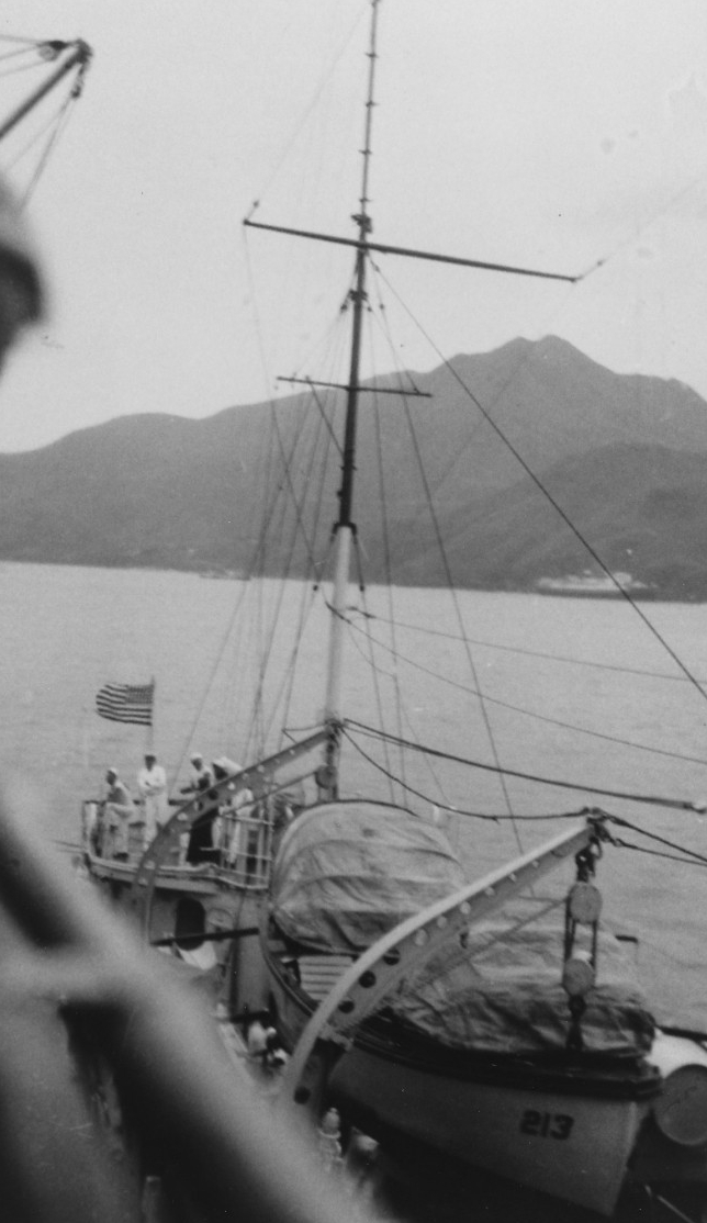 Barker moors alongside another ship, probably patrol vessel (converted yacht) Isabel (PY-10), off the south China coast, circa 1938. Only Barker’s after portion is visible, including a boat and its davits, the mainmast and the top of the after su...