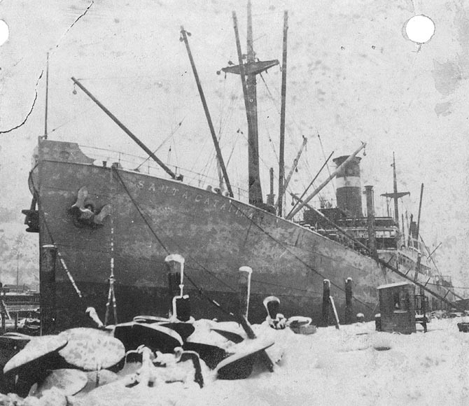 The freighter Santa Catalina in port on a snowy day. (Naval History and Heritage Command Photograph NH 99386)