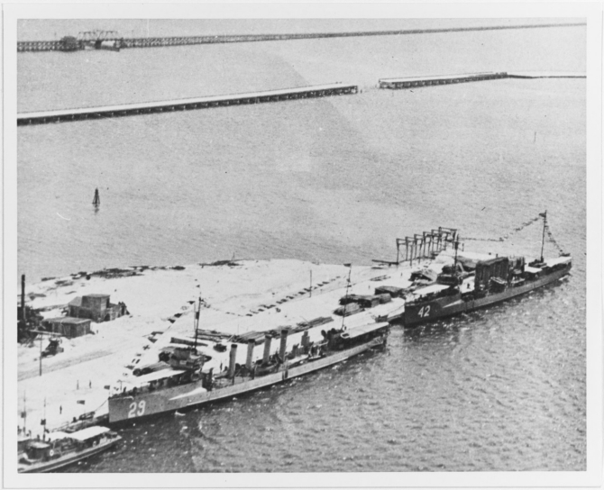 Burrows and Jenkins (Destroyer No. 42) in port, dressed with flags, circa 1919. Courtesy of the National Museum of the Marine Corps. (Naval History and Heritage Command Photograph NH 103739)