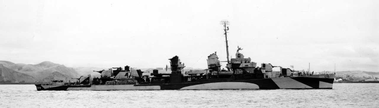 Underway near Mare Island, Bush, painted in Ocean Gray (5-O) and Black, stands up the channel, 11 June 1944. (U.S. Navy Bureau of Ships Photograph BS-67645, National Archives and Records Administration, Still Pictures Division, College Park, Md.)