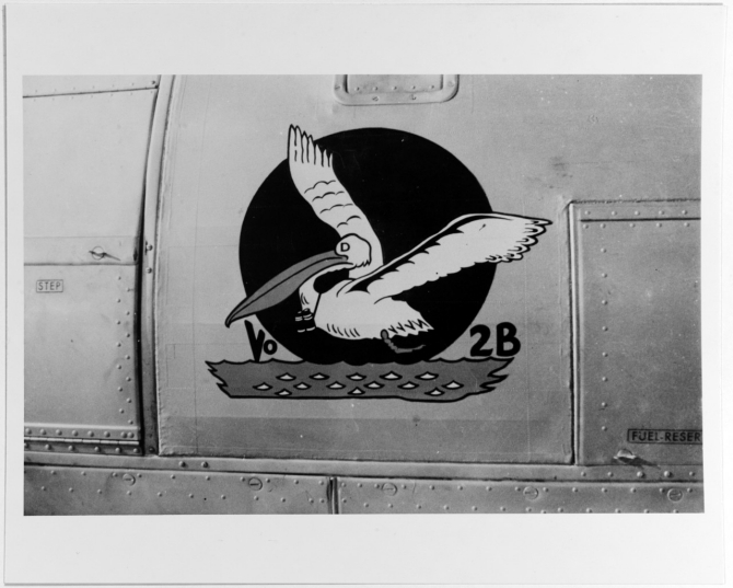 A close up view of the port side of the fuselage of one of the Curtiss SOC-3 Seagulls of Observation Squadron (VO) 2B embarked on board the ship, shows the squadron’s Pelican insignia, circa 1938. (Courtesy of Howard F. Ailes, Naval History and Heritage Command Photograph NH 80519)